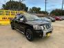 2012 Nissan Titan (1N6BA0ED2CN) , located at 16710 Clay Rd., Houston, TX, 77084, (281) 859-7900, 29.834864, -95.656166 - Photo#4